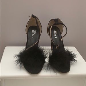 Never worn black feather heels